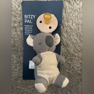 Bitzy Pal by Itzy Ritzy
Koala and pacifier 
New and attached to package